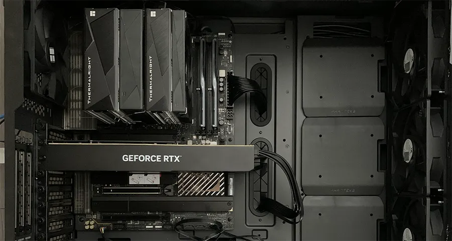 The RTX 4080 SUPER 32GB blower-style card installed in the test PC, with the MiniMax H3 logo overlaid
